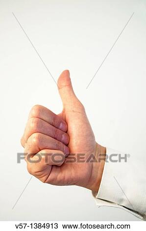 Man's hand with thumb up. Close view. View Large Photo Image Stock Image - Man's hand with thumb up. Close view.. Fotosearch