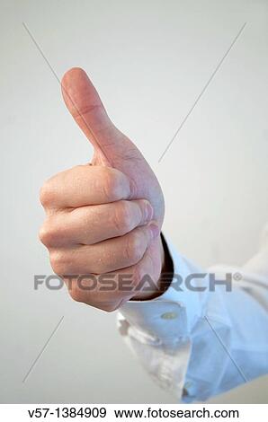 Man's hand with thumb up. Close view. View Large Photo Image Stock Photo - Man's hand with thumb up. Close view.. Fotosearch