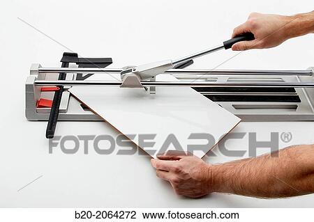 Manual tile cutter. Cutting tile. Construction Industry. View Large Photo Image Stock Image - Manual tile cutter. Cutting tile. Construction Industry.. Fotosearch
