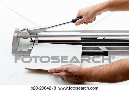 Manual tile cutter. Cutting tile. Construction Industry. View Large Photo Image Stock Image - Manual tile cutter. Cutting tile. Construction Industry.. Fotosearch