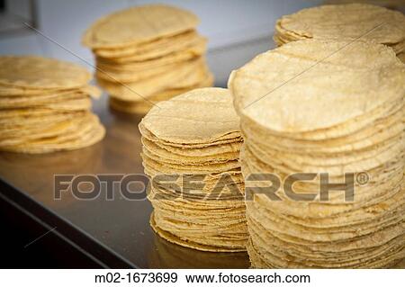 Manufacture of mexican tortillas in Madrid, Spain View Large Photo Image Stock Photo - Manufacture of mexican tortillas in Madrid, Spain. Fotosearch