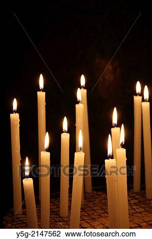 Many candles inside santa maria in trastevere church in Rome Italy View Large Photo Image Stock Image - Many candles inside santa maria in trastevere church in Rome Italy. Fotosearch