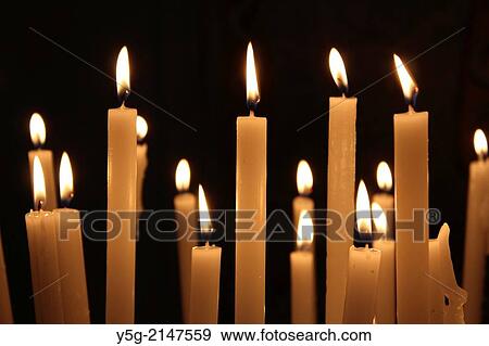 Many candles inside santa maria in trastevere church in Rome Italy View Large Photo Image Stock Photo - Many candles inside santa maria in trastevere church in Rome Italy. Fotosearch