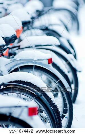 Many snow covered bicycles outside Fitzwilliams college, Cambridge View Large Photo Image Stock Image - Many snow covered bicycles outside Fitzwilliams college, Cambridge. Fotosearch