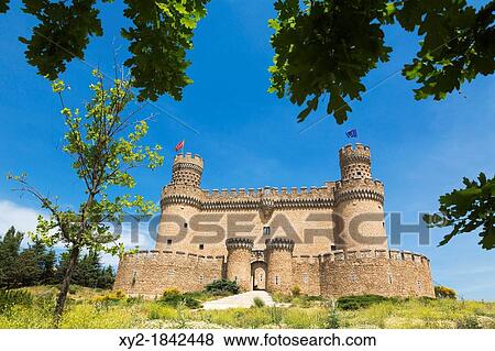 Stock Photo - Manzanares el Real, Comunidad de Madrid, Spain The 15th century Castle of the Mendoza An example of Castillian military architecture of the period. Fotosearch