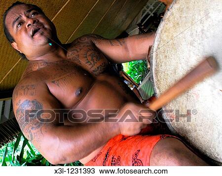 Maori with drum French Polynesian View Large Photo Image Stock Image - Maori with drum French Polynesian. Fotosearch