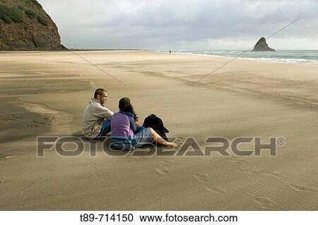 Maori Woman and Man resting on Waipoua Beach View Large Photo Image Stock Image - Maori Woman and Man resting on Waipoua Beach. Fotosearch