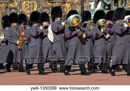 Marching band at the Changing of the Guard ceremony outside Buckingham Palace in London, England View Large Photo Image Stock Photo - Marching band at the Changing of the Guard ceremony outside Buckingham Palace in London, England. Fotosearch