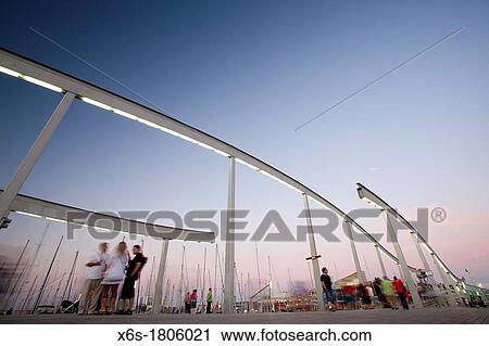 Stock Image - Maremagnum at sunset, Barcelona harbour, Barcelona, Spain. Fotosearch
