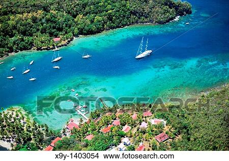 Marigot Bay, south of Castries on the west coast of the island of St Lucia in the Caribbean Location for film Dr Dolittle View Large Photo Image Picture - Marigot Bay, south of Castries on the west coast of the island of St Lucia in the Caribbean Location for film Dr Dolittle. Fotosearch