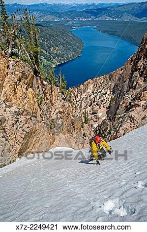 Mark Weber climbing the Chockstone Couloir, AKA the Boy Scout Couloir an alpine route which is rated Grade 3, Class 4 and located on The Grand Mogul in the Sawtooth Mountains in central Idaho. View Large Photo Image Stock Image - Mark Weber climbing the Chockstone Couloir, AKA the Boy Scout Couloir an alpine route which is rated Grade 3, Class 4 and located on The Grand Mogul in the Sawtooth Mountains in central Idaho.. Fotosearch