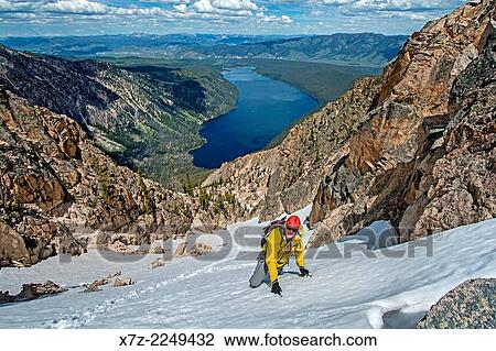 Mark Weber climbing the Chockstone Couloir, AKA the Boy Scout Couloir an alpine route which is rated Grade 3, Class 4 and located on The Grand Mogul in the Sawtooth Mountains in central Idaho. View Large Photo Image Stock Image - Mark Weber climbing the Chockstone Couloir, AKA the Boy Scout Couloir an alpine route which is rated Grade 3, Class 4 and located on The Grand Mogul in the Sawtooth Mountains in central Idaho.. Fotosearch