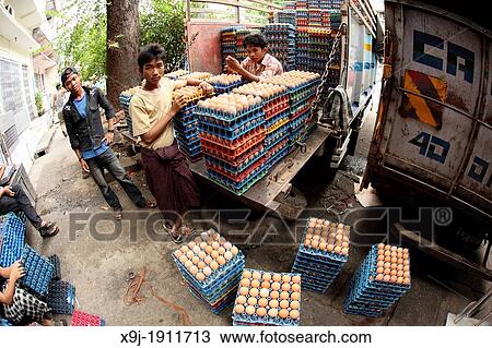 Stock Image - Market Street Scene selling Eggs, yangon, Myanmar, Burma, Asia. Fotosearch