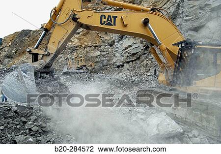 Stock Image - Marl extraction at quarry for cement plant. Fotosearch