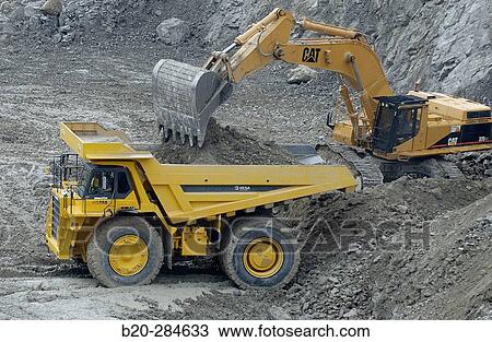 Stock Image - Marl extraction at quarry for cement plant. Fotosearch