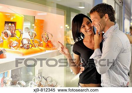 Married couple in front of the jewelry. View Large Photo Image Stock Photography - Married couple in front of the jewelry.. Fotosearch