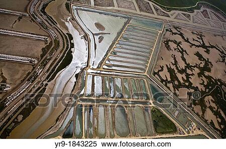 Stock Photography - Marshes and salt lakes of Barbate de Franco CBdiz Spain Aerial view.. Fotosearch
