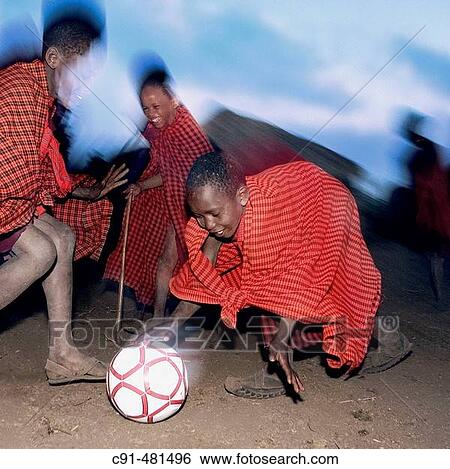 Masai children playing football. Tanzania View Large Photo Image Stock Photograph - Masai children playing football. Tanzania. Fotosearch