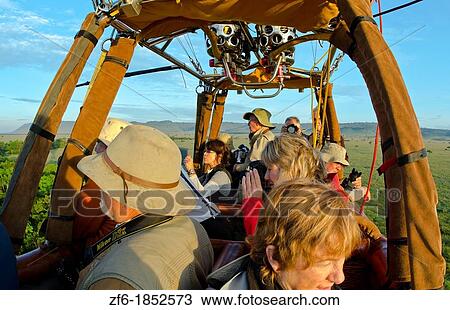 Masai Mara National Park Kenya Africa balloon ride for tourists early morning in Masai Mara people in basket together with balloon View Large Photo Image Stock Image - Masai Mara National Park Kenya Africa balloon ride for tourists early morning in Masai Mara people in basket together with balloon. Fotosearch