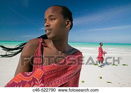 Masai people. Kiwengwa beach. Zanzibar Island. Tanzania View Large Photo Image Stock Image - Masai people. Kiwengwa beach. Zanzibar Island. Tanzania. Fotosearch