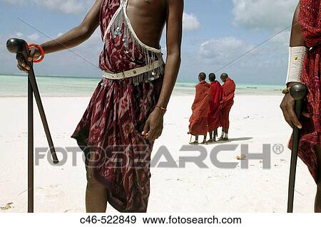 Masai people. Paje beach. Zanzibar Island. Tanzania View Large Photo Image Stock Photo - Masai people. Paje beach. Zanzibar Island. Tanzania. Fotosearch
