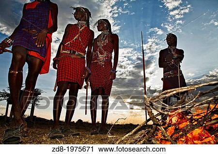 Stock Image - masais in kenia at sunset.. Fotosearch