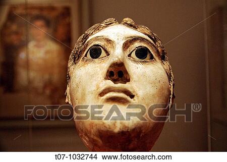 Picture - Mask of a Woman with a Large Coil of Plaited Hair, Reign of Hadrian, 117-138 AD, Metropolitan Museum of Art, New York City. Fotosearch