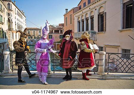 Masked people at the carnival in Venice, Italy, Europe View Large Photo Image Stock Photo - Masked people at the carnival in Venice, Italy, Europe. Fotosearch