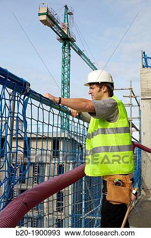 Mason, Bricklayer with personal protective equipment, PPE, Apartment Building under construction, Donostia, San Sebastian, Gipuzkoa, Basque Country, Spain View Large Photo Image Stock Image - Mason, Bricklayer with personal protective equipment, PPE, Apartment Building under construction, Donostia, San Sebastian, Gipuzkoa, Basque Country, Spain. Fotosearch