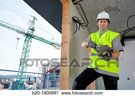 Mason with trowel, Bricklayer with personal protective equipment, PPE, Apartment Building under construction, Donostia, San Sebastian, Gipuzkoa, Basque Country, Spain View Large Photo Image Stock Photo - Mason with trowel, Bricklayer with personal protective equipment, PPE, Apartment Building under construction, Donostia, San Sebastian, Gipuzkoa, Basque Country, Spain. Fotosearch