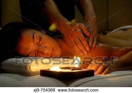 Massage by candlelight. View Large Photo Image Stock Photograph - Massage by candlelight.. Fotosearch