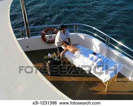 Massage in Bora Bora Cruisers, French Polynesia View Large Photo Image Stock Photograph - Massage in Bora Bora Cruisers, French Polynesia. Fotosearch