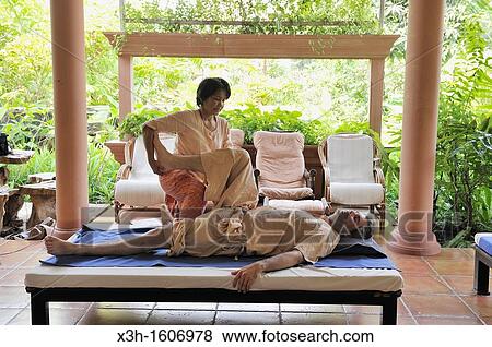 massage session, Ayatthuya Garden River Home, Wellness and Organic Resort, Thailand, Asia View Large Photo Image Stock Photo - massage session, Ayatthuya Garden River Home, Wellness and Organic Resort, Thailand, Asia. Fotosearch