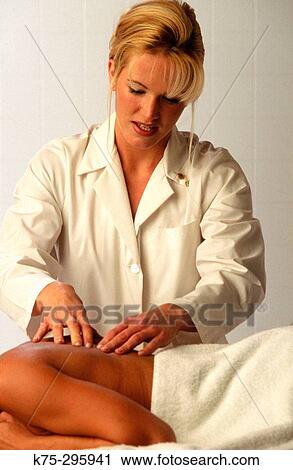 Stock Image - Massage therapist. Fotosearch