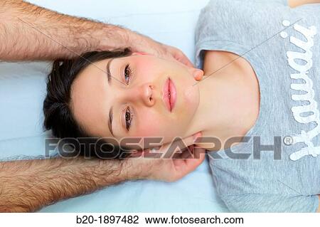 Stock Image - Massage therapy in cervical musculature Gym Physiotherapy medical center, Donostia, San Sebastian, Gipuzkoa, Basque Country, Spain. Fotosearch