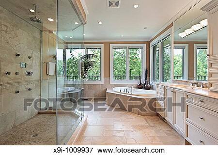 Master bath in new construction home with large glass shower View Large Photo Image Stock Photo - Master bath in new construction home with large glass shower. Fotosearch