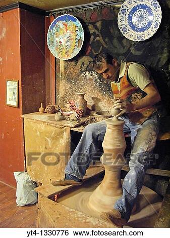 Master Potter Kadir at work Firca Ceramics, Sultanahmet, Istanbul, Turkey View Large Photo Image Stock Photograph - Master Potter Kadir at work Firca Ceramics, Sultanahmet, Istanbul, Turkey. Fotosearch