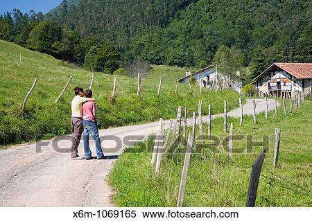 mather and son in a country scene Cortezubi, Biscay, Basque Country, Spain View Large Photo Image Stock Photography - mather and son in a country scene Cortezubi, Biscay, Basque Country, Spain. Fotosearch