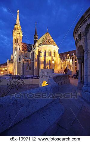 Stock Image - Matthias Church at dusk, Budapest, Hungary.. Fotosearch
