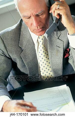 Mature business man talking on cellular phone View Large Photo Image Stock Image - Mature business man talking on cellular phone. Fotosearch