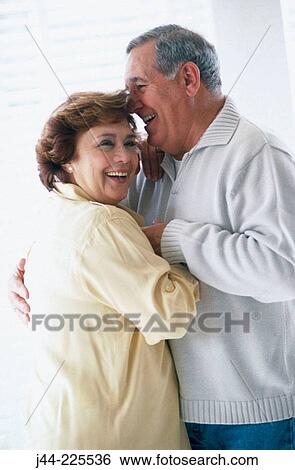 Stock Photograph - Mature couple dancing in the house. Fotosearch