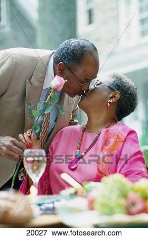 Stock Photo - Mature couple kissing. Fotosearch