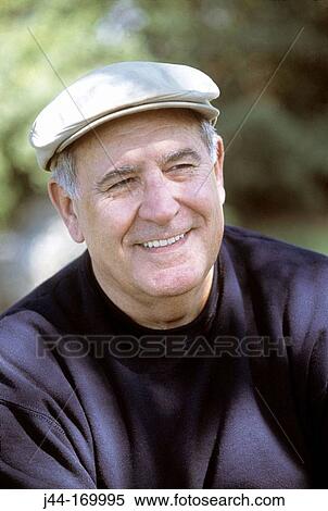 Mature man with hat smiling View Large Photo Image Stock Photography - Mature man with hat smiling. Fotosearch