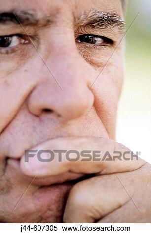 Mature man's face with hand on mouth View Large Photo Image Stock Photography - Mature man's face with hand on mouth. Fotosearch
