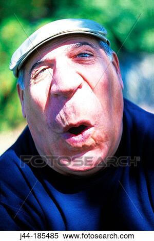Mature man's face with hat View Large Photo Image Stock Photography - Mature man's face with hat. Fotosearch