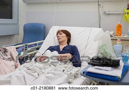 Mature woman in hospital bed. View Large Photo Image Stock Image - Mature woman in hospital bed.. Fotosearch