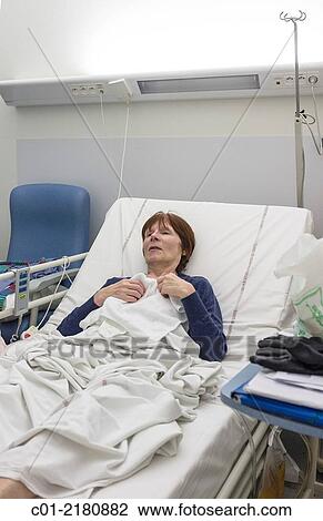 Mature woman in hospital bed. View Large Photo Image Stock Image - Mature woman in hospital bed.. Fotosearch