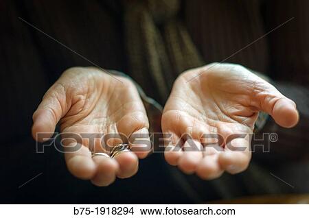 mature woman showing empty hands View Large Photo Image Picture - mature woman showing empty hands. Fotosearch