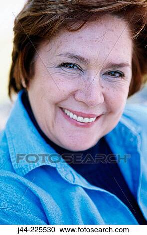Stock Image - Mature woman smiling. Fotosearch