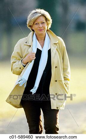 Mature woman strolling View Large Photo Image Stock Image - Mature woman strolling. Fotosearch